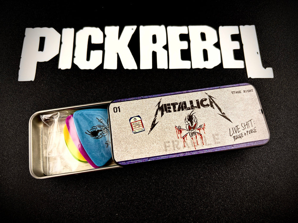 Metallica Vintage Pick Tin open with six reissue guitar picks Metallica Vintage Pick Tin open with six reissue guitar picks