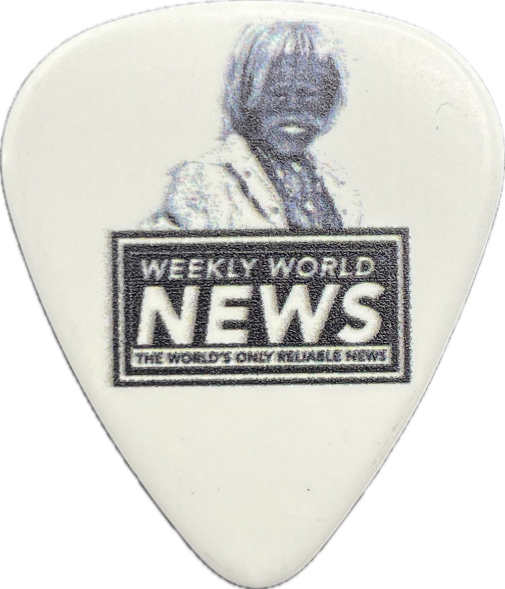 Weekly World News Bigfoot artwork on a white guitar pick Weekly World News Bigfoot artwork on a white guitar pick