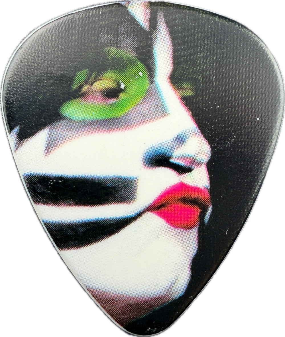 Front of the Eric Singer KISS The Tour 2012 V.I.P. guitar pick with Catman portrait