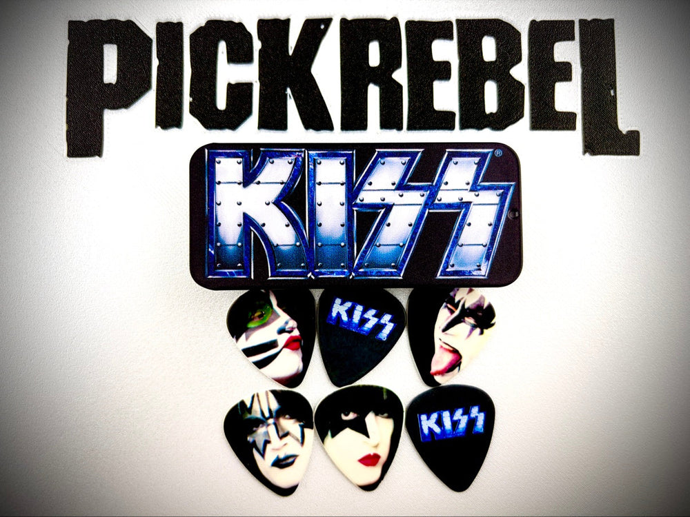 PICKREBEL editorial photo of the KISS THE TOUR 2012 V.I.P. guitar pick tin with its six picks arranged below
