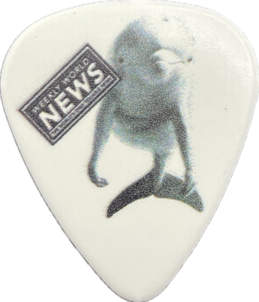 Weekly World News dolphin artwork on a white guitar pick