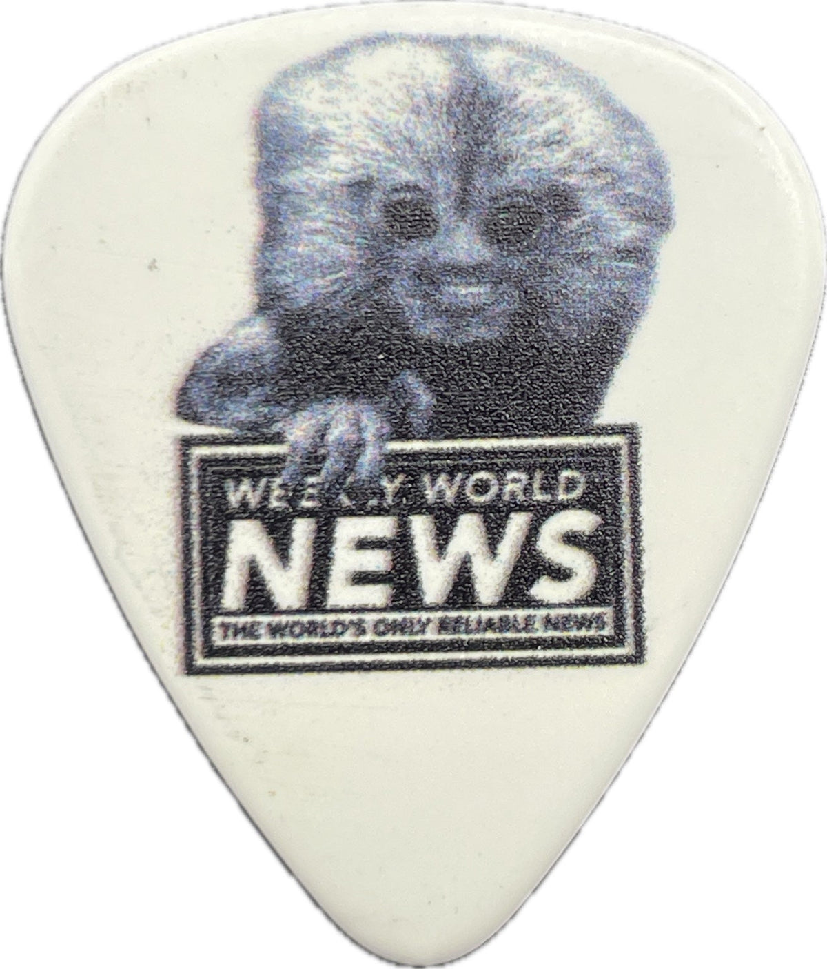 Weekly World News Little Monkey Man artwork on a white guitar pick