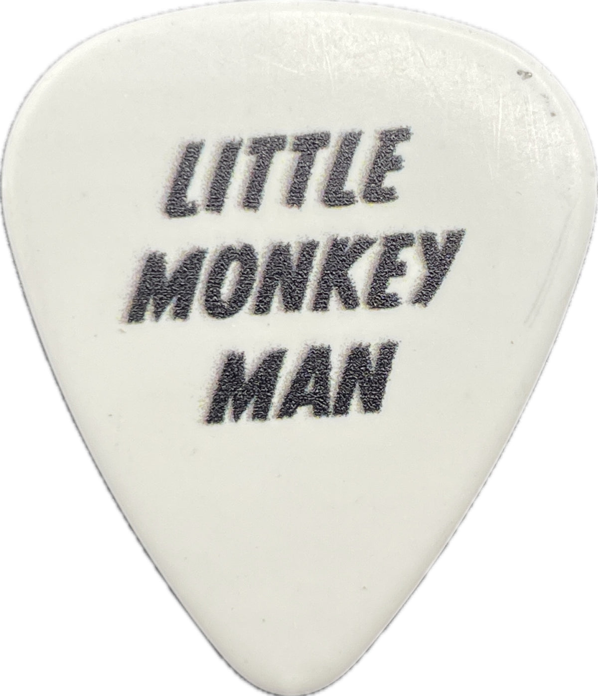 Little Monkey Man text on reverse of guitar pick reverse